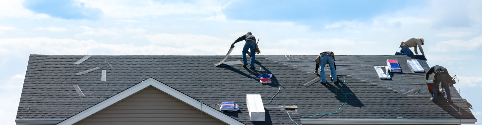 construction workers fixing the roof